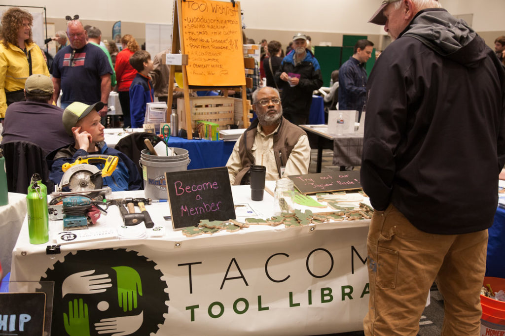 Picture of man at Tacoma Tool Library booth
